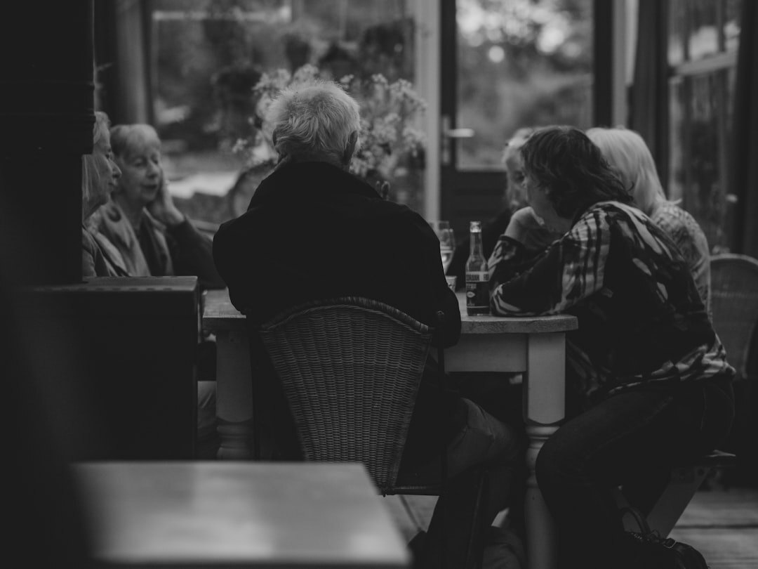 elderly and young people arguing
