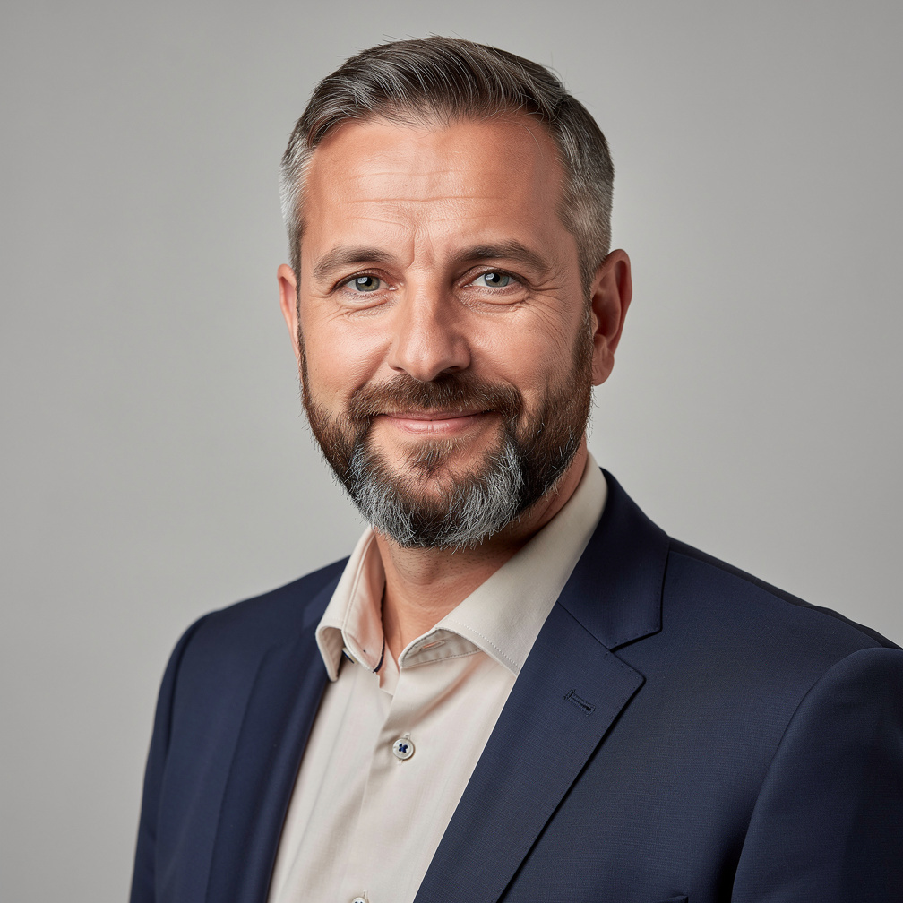 Studio portrait of a German man in his 40s, statistician
