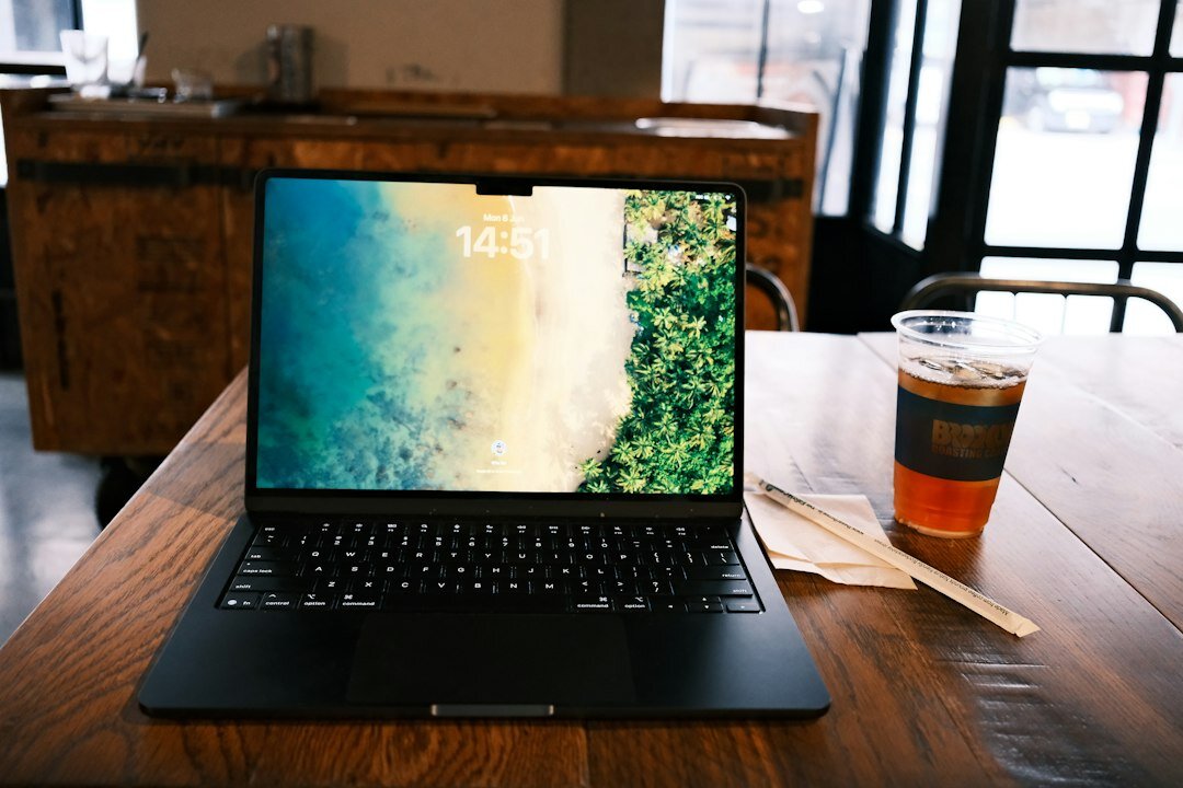 Laptop screen displaying statistical charts and graphs